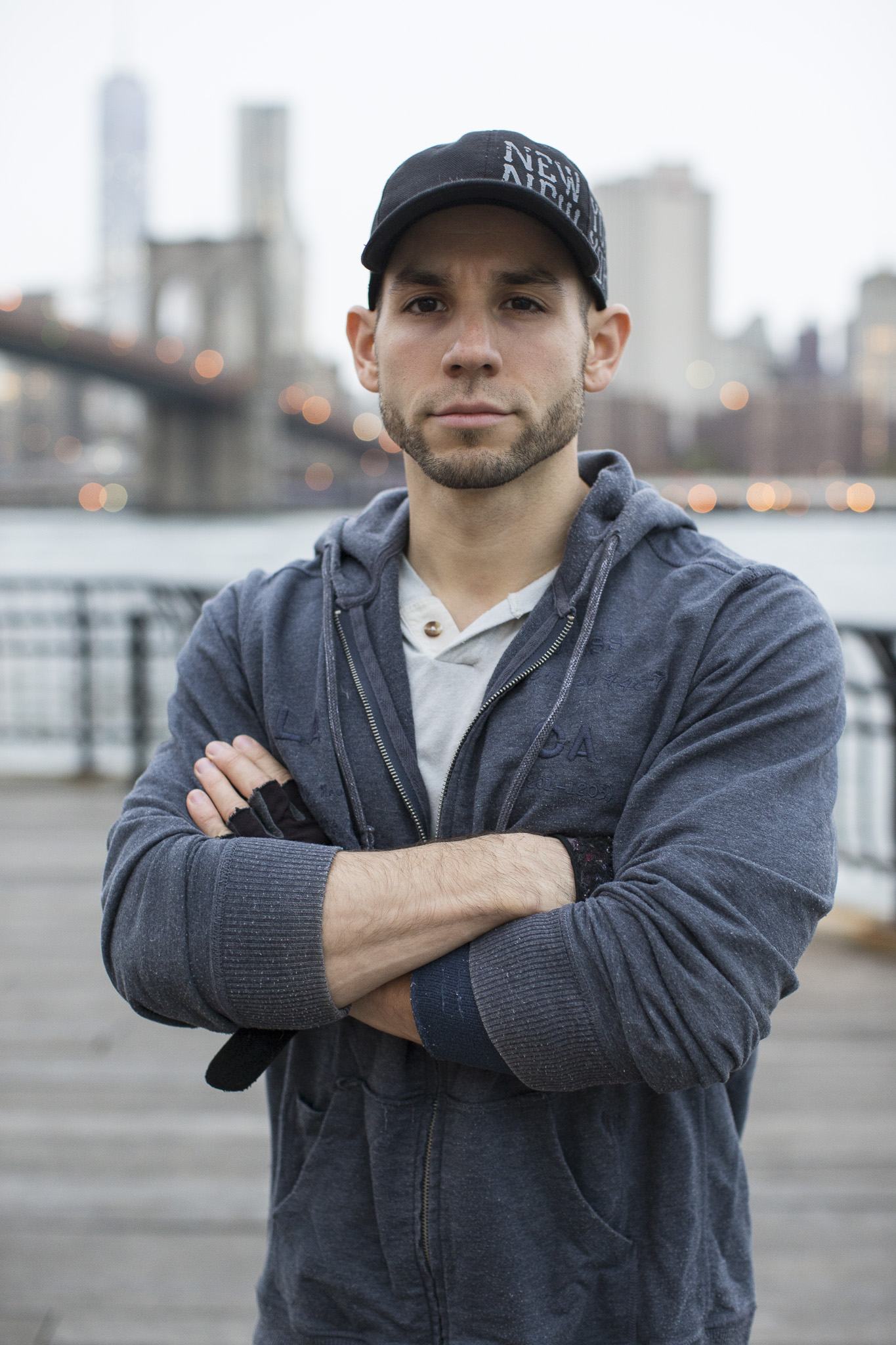 Founder of Brooklyn BodyFit, Brooklyn Bridge in background